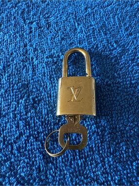 Louis Vuitton Shiny Gold Padlock Charm with Key for bag charm key charm or lock